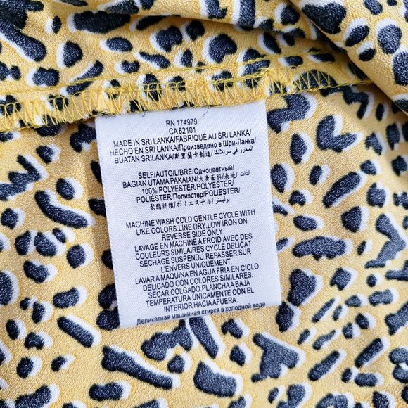 NWT BCBGeneration Printed Front Slit Midi Skirt Yellow/Black Animal Print Size 2 - Picture 9 of 9